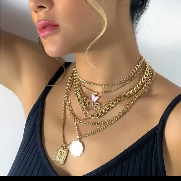 Golden Layered Necklace with Heart and Engraved Pendants
7 piece set - Picture 3 of 6